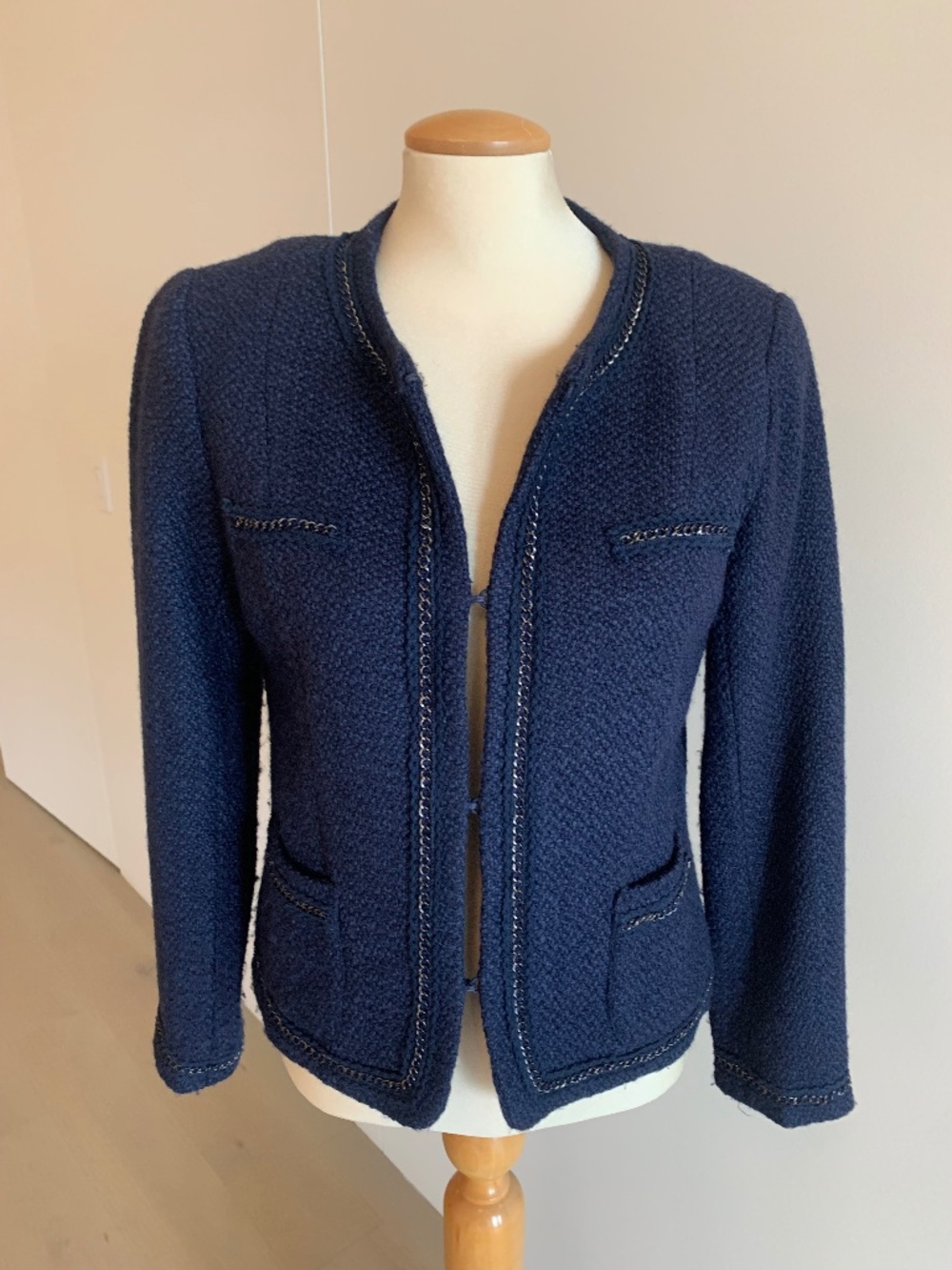 Navy boucle tweed blazer with chain trim